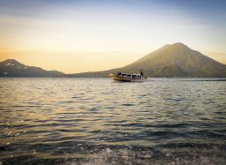 Tourist,Boat,On,Lake,Atitlan,With,Water,Splashing