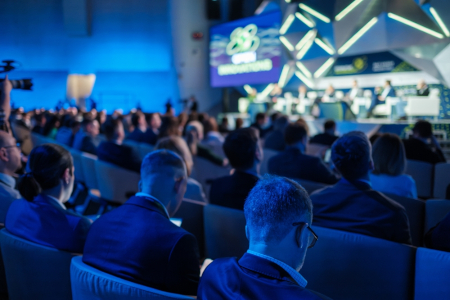 Attentive,Audience,Listens,As,Experts,Discuss,Global,Trends,At,An
